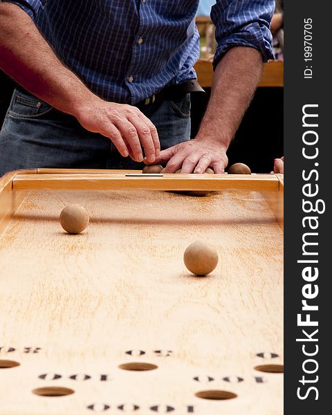 Man Playing Japanese traditional billiards. Man Playing Japanese traditional billiards