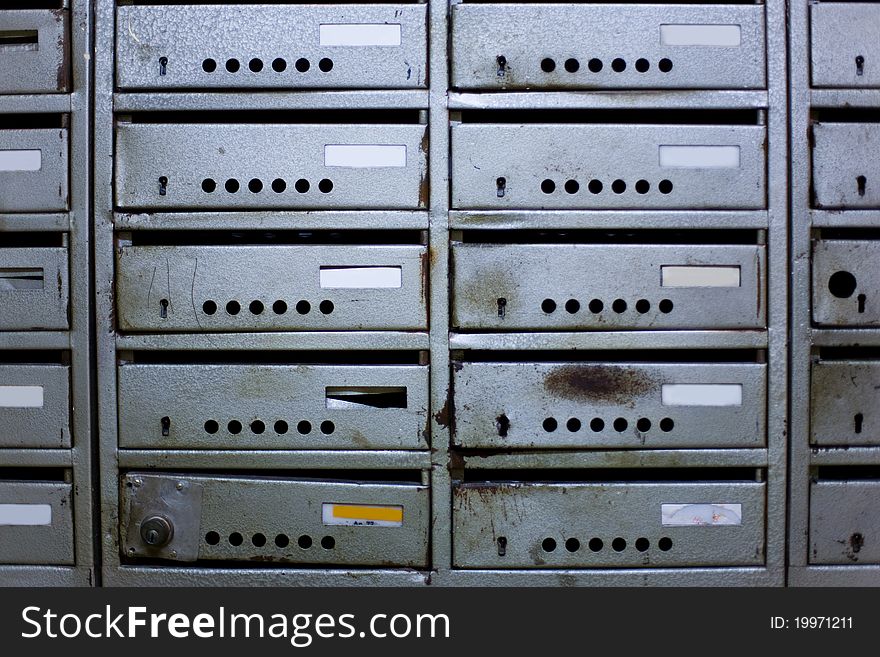 Many old metal mailboxes. Many old metal mailboxes