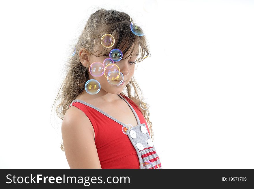 Beautiful white child making bubbles. Beautiful white child making bubbles