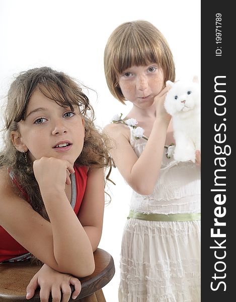 Beautiful two sisters having fun with toys. Beautiful two sisters having fun with toys