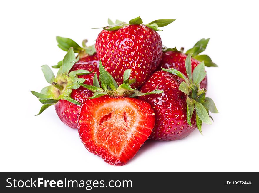 Pile of fresh strawberries across white