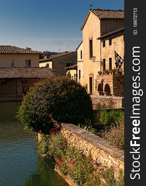 The old thermal basin in the center of Bagno Vignony, Tuscany. The old thermal basin in the center of Bagno Vignony, Tuscany