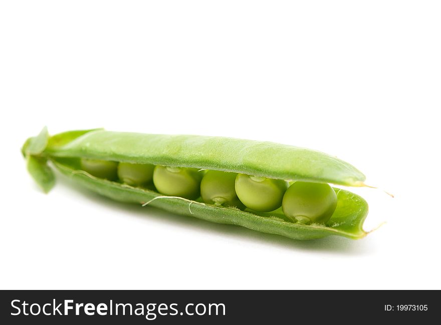 Green peas on a white background