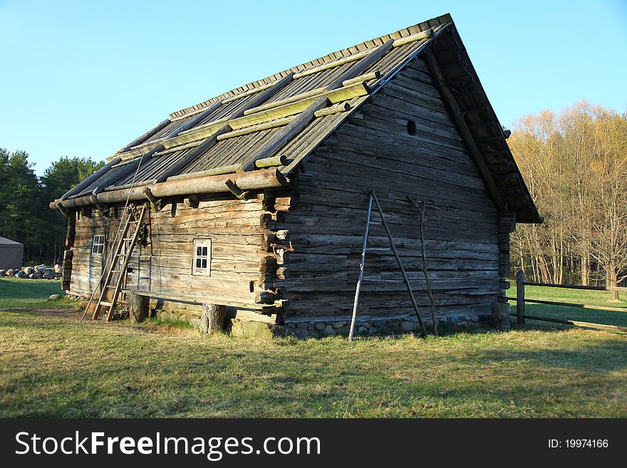 Ancient house at open-air museum in spring, Latvia. Ancient house at open-air museum in spring, Latvia.