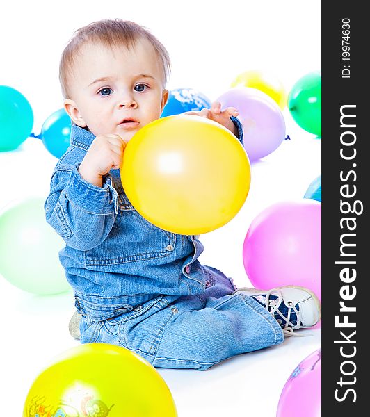 Baby with green apple. Isolated on white background