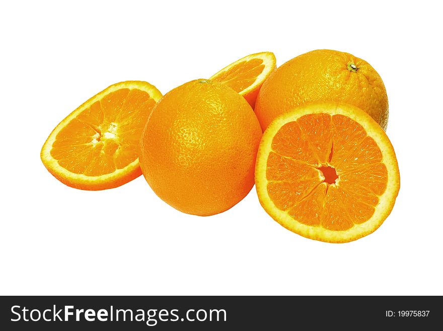 Ripe orange fruits isolated - whole and sliced - full of vitamins. Ripe orange fruits isolated - whole and sliced - full of vitamins
