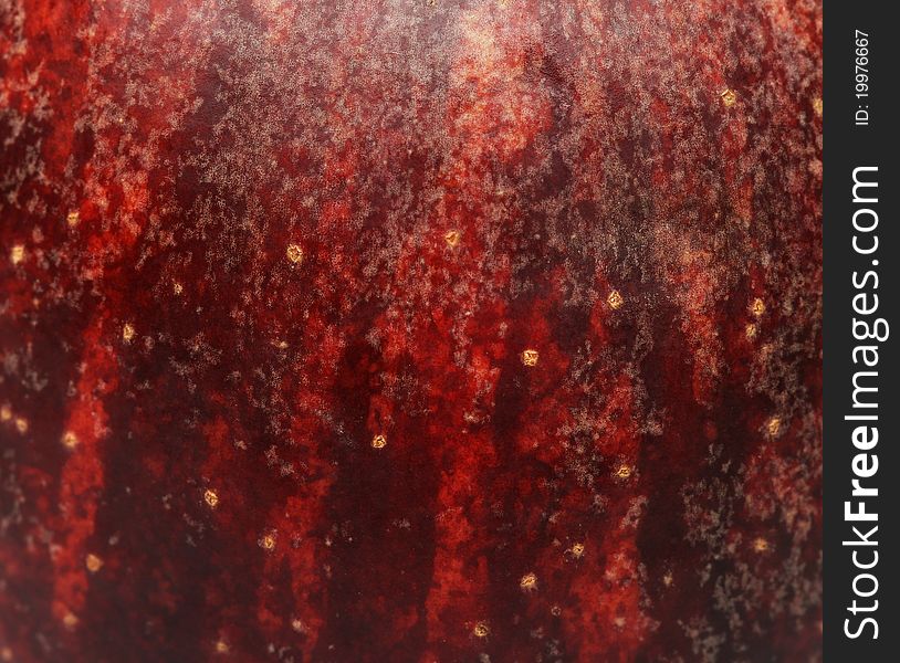 Background a red apple-close up