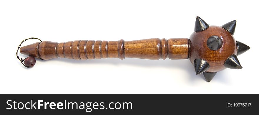 Wooden brown mace. souvenir. isolated. white background. Wooden brown mace. souvenir. isolated. white background.