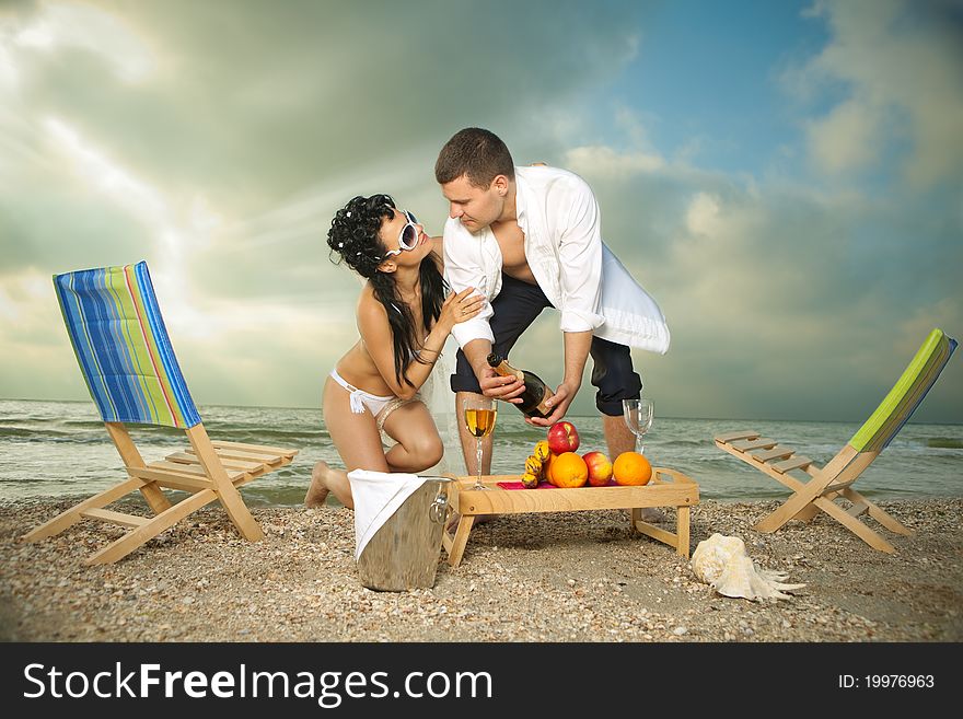 Couple resting on the beach