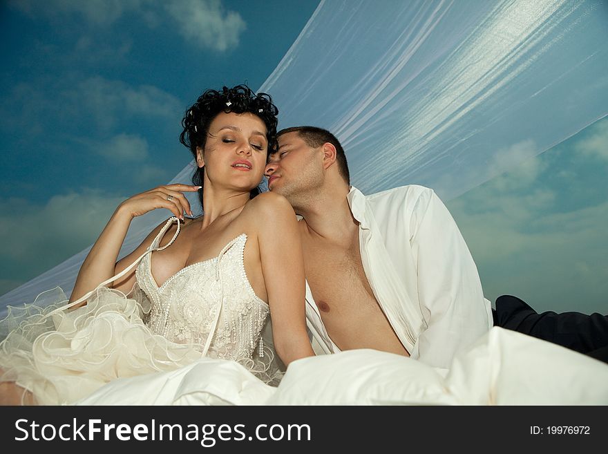 Wedding shot of sexy passion between bride and groom