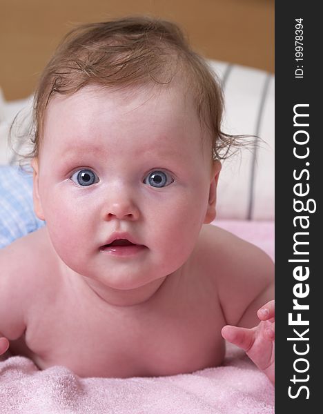 Little baby girl portrait over soft defocused background. Little baby girl portrait over soft defocused background