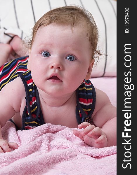 Little baby girl portrait over soft defocused background. Little baby girl portrait over soft defocused background