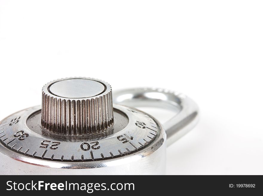 Close up of a secure combination dial silver padlock. Close up of a secure combination dial silver padlock