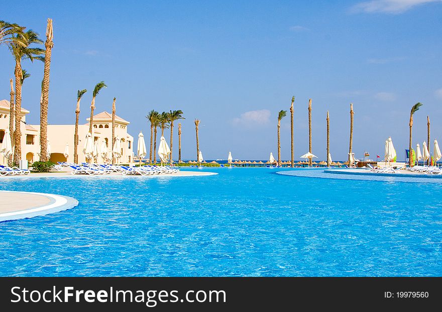 Swimming pool are under the open sky ashore the Red sea . Egypt . Swimming pool are under the open sky ashore the Red sea . Egypt .