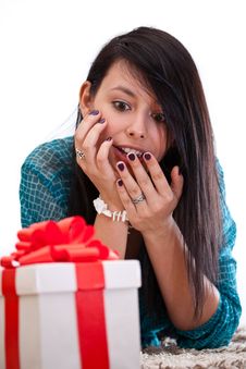 Woman On The Floor With Gift Box Royalty Free Stock Photography
