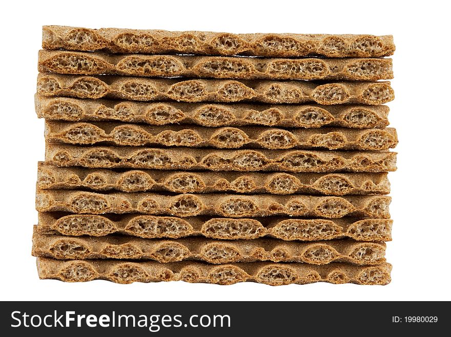 Stack of rye crispbread isolated on white background.