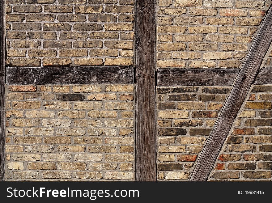 Old brick wall with framework