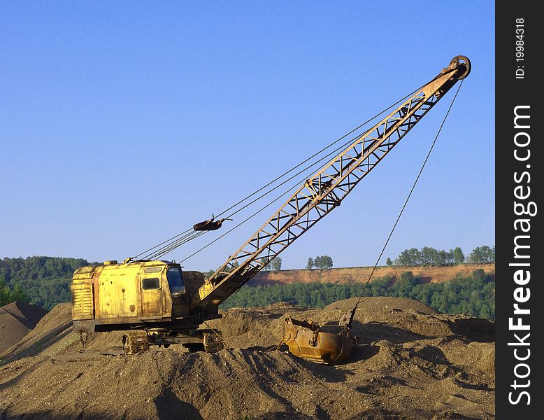 Close up of a excavator on a macadam