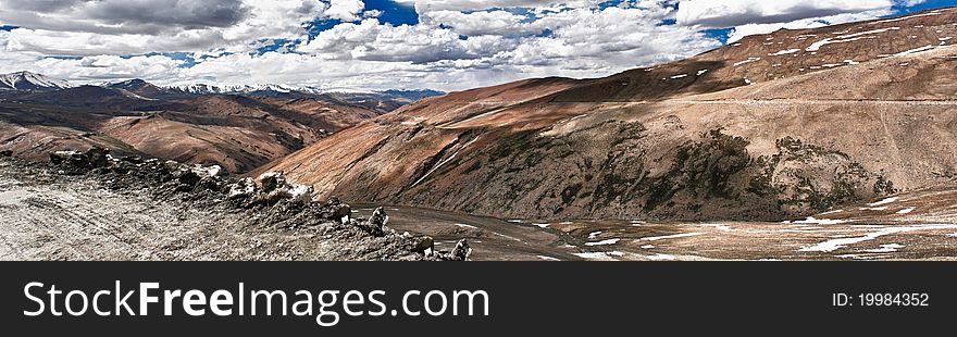 Tanglang La Pass from Himalaya (elevation 17,582 feet (5,359 m)). Zanskar region from Ladakh. Worlds second highest motorable pass at an altitude of 5,325 m, it is located along the Leh-Manali Highway. Tanglang La Pass from Himalaya (elevation 17,582 feet (5,359 m)). Zanskar region from Ladakh. Worlds second highest motorable pass at an altitude of 5,325 m, it is located along the Leh-Manali Highway.