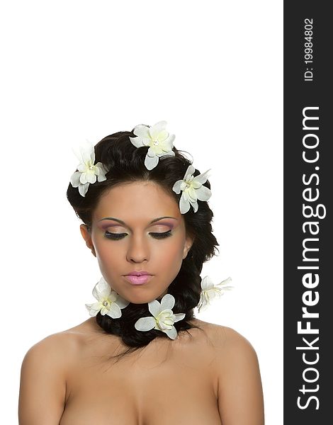 Attractive young beautiful natural model woman with chamomile flowers on head with hairstyle and eye makeup isolated over white background. Spring, summer girl, concept of healthy lifestyle metaphor. Attractive young beautiful natural model woman with chamomile flowers on head with hairstyle and eye makeup isolated over white background. Spring, summer girl, concept of healthy lifestyle metaphor