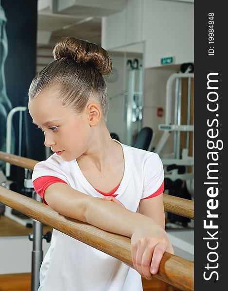Portrait of young beauty gymnast in gymnasium. Portrait of young beauty gymnast in gymnasium