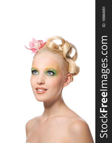 Attractive young beautiful natural model woman with orchid flower on head with hairstyle and eye makeup isolated over white background. Spring, summer girl, concept of healthy lifestyle metaphor. Attractive young beautiful natural model woman with orchid flower on head with hairstyle and eye makeup isolated over white background. Spring, summer girl, concept of healthy lifestyle metaphor