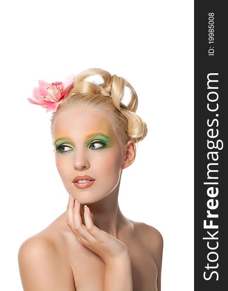 Attractive young beautiful natural model woman with orchid flower on head with hairstyle and eye makeup isolated over white background. Spring, summer girl, concept of healthy lifestyle metaphor. Attractive young beautiful natural model woman with orchid flower on head with hairstyle and eye makeup isolated over white background. Spring, summer girl, concept of healthy lifestyle metaphor