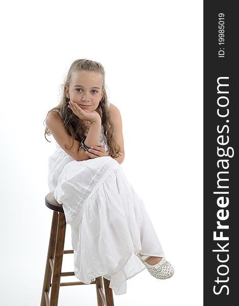 White beautiful child posing in studio. White beautiful child posing in studio