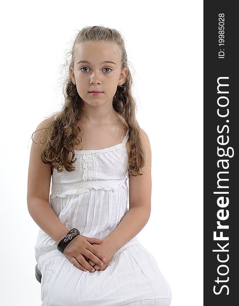 White beautiful child posing in studio. White beautiful child posing in studio