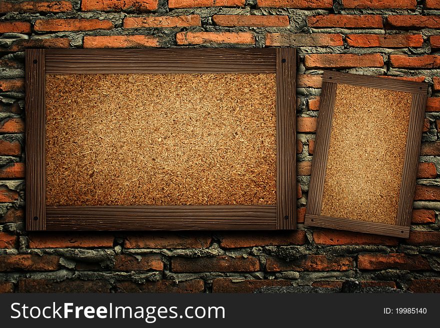 Old wood frame on brick wall