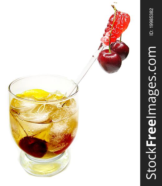 Alcohol brandy cocktail drink with ice and cherry. Alcohol brandy cocktail drink with ice and cherry