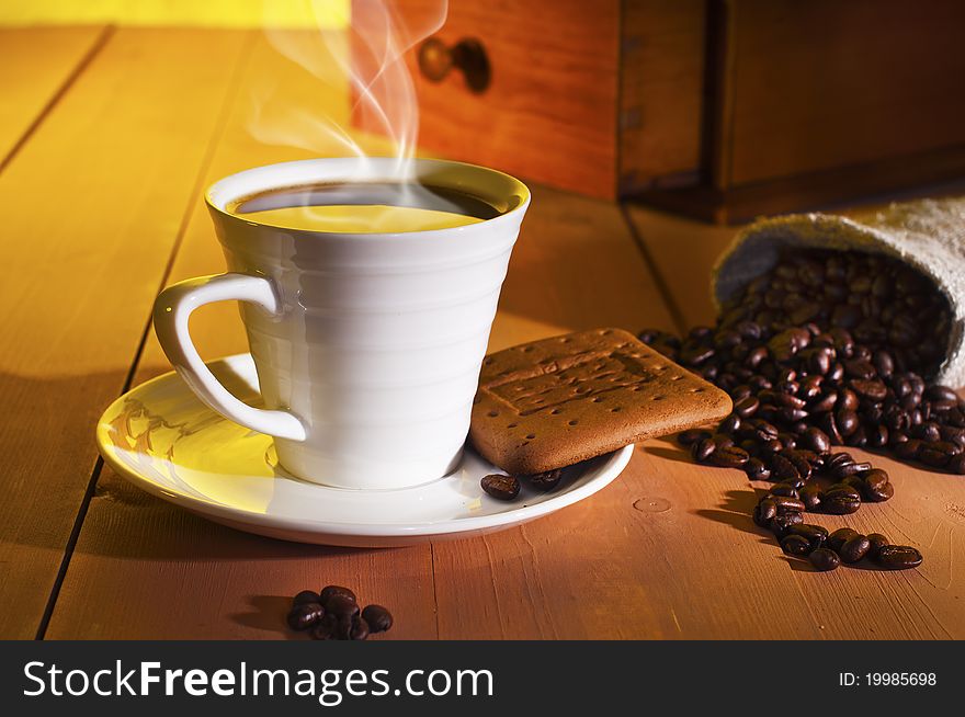 Coffee, coffee beans and coffee grinder on the table. Coffee, coffee beans and coffee grinder on the table