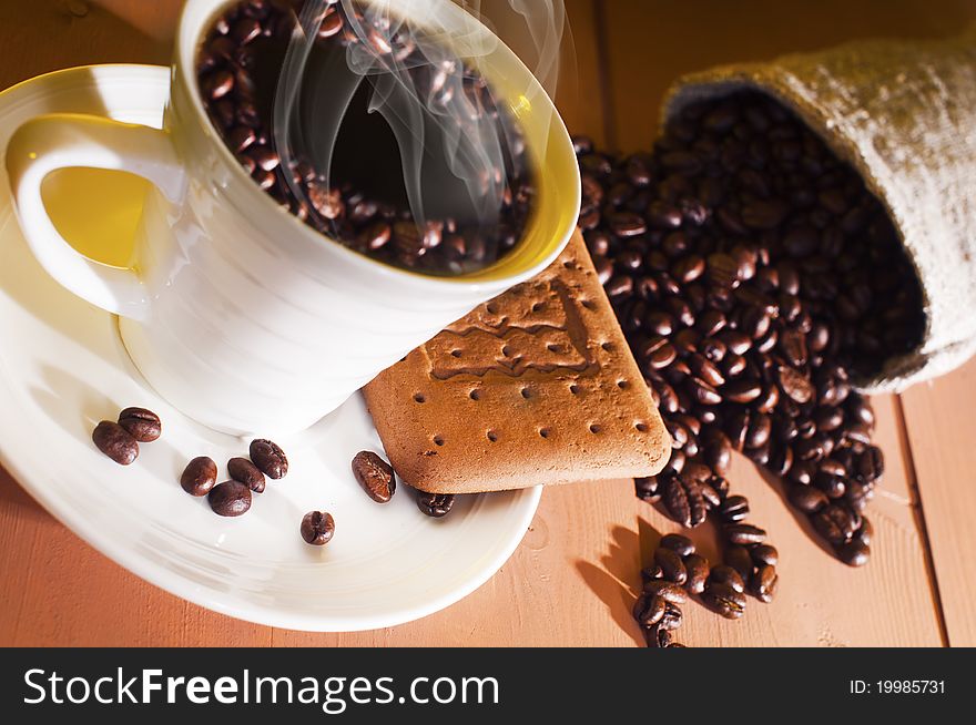 Coffee, coffee beans and on the table. Coffee, coffee beans and on the table