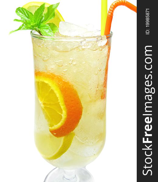 Yellow lemonade drink with lemon and orange fruit