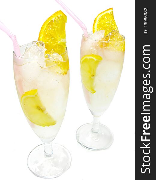 Alcoholic white cocktail drinks with ice and lemon. Alcoholic white cocktail drinks with ice and lemon
