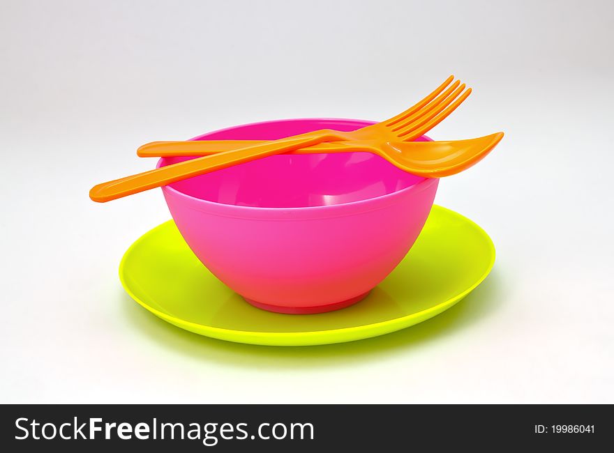 Colorful Picnic plastic set with bowl, dish,and spoon.