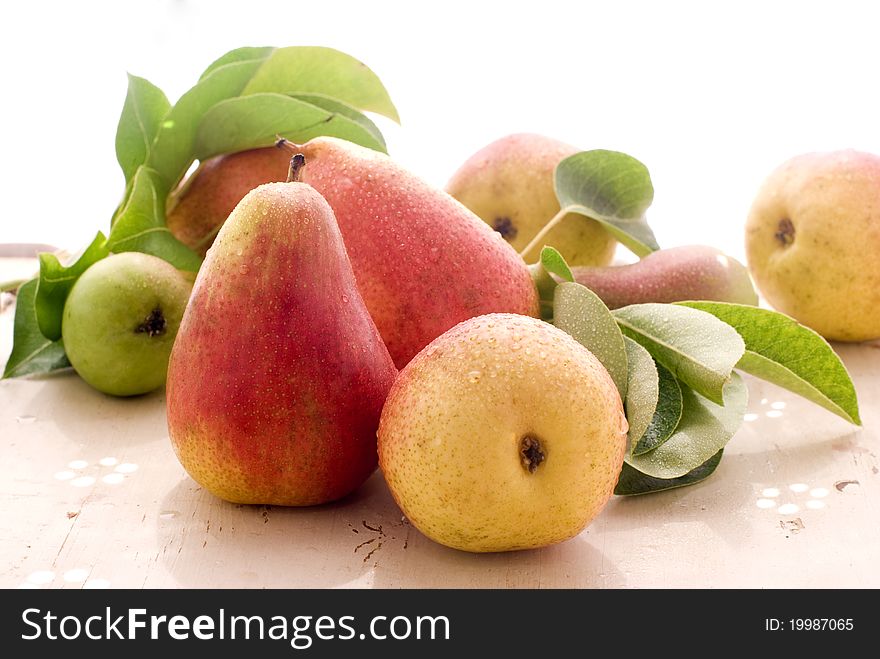 Sweet pears with green leaves