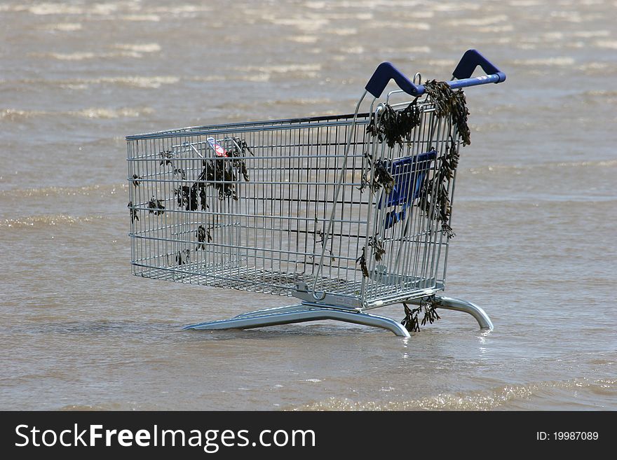 Supermarket trolly in the sea. Supermarket trolly in the sea