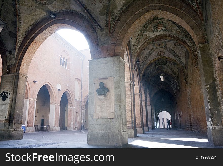 Medieval court with fresco shining by the sun