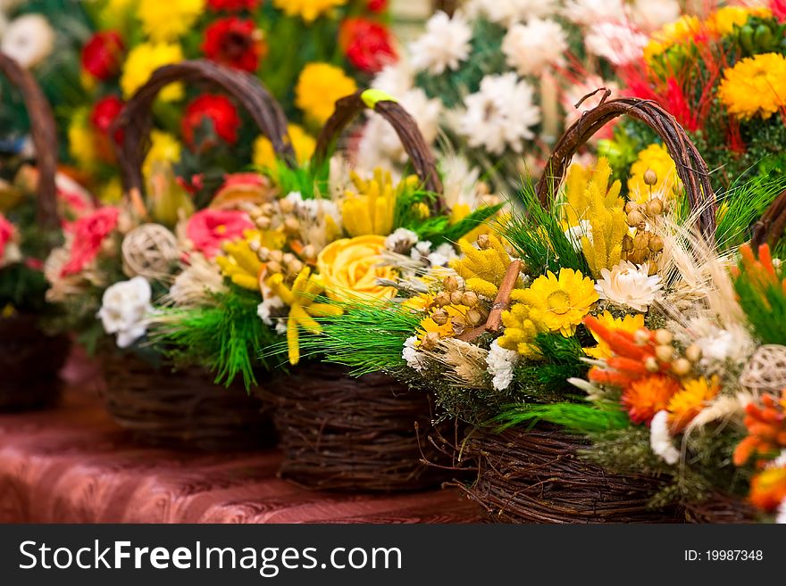 Colorful easter baskets on a stall