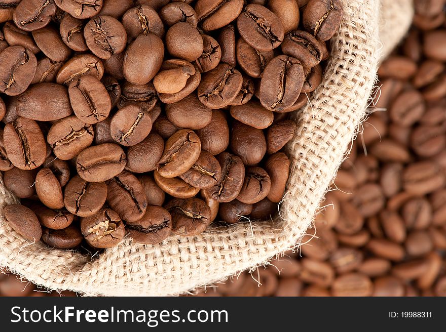 Closeup of coffee beans in canvas sack