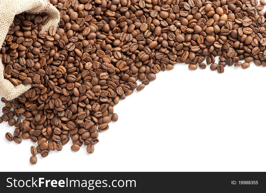 Coffee beans and burlap sack isolated on white