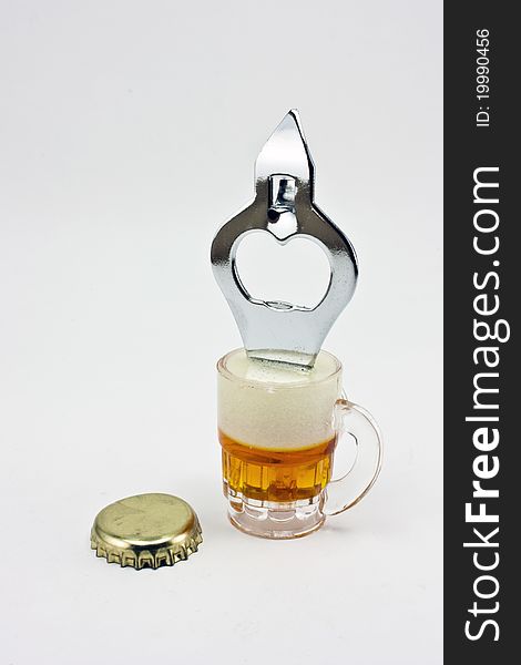Beer bottle opener with cap isolated on a white background
