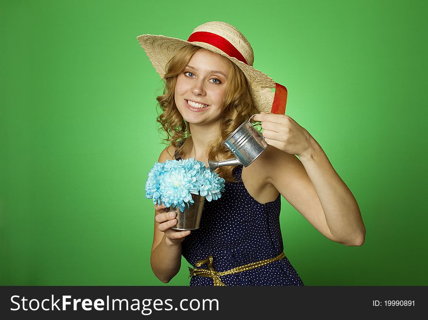 Attractive Girl Watering Flowers