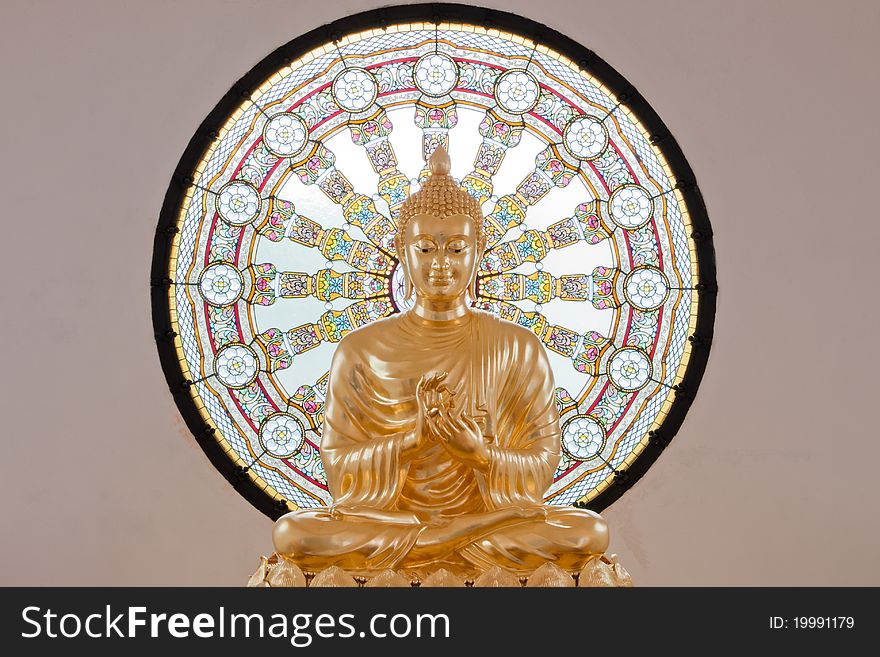 Gold statue image of buddha at Phetchabun province, Thailand. The temple open to the public to watch. And allowed to take photos in the temple. no restriction in copy or use, no name of artist appear. This photo is taken under these conditions.