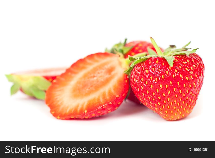 Ripe juicy strawberries isolated on white background. Ripe juicy strawberries isolated on white background
