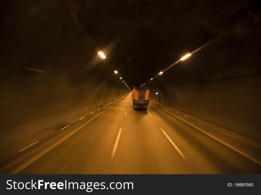 Three way, long tunnel. Transportation and roads.