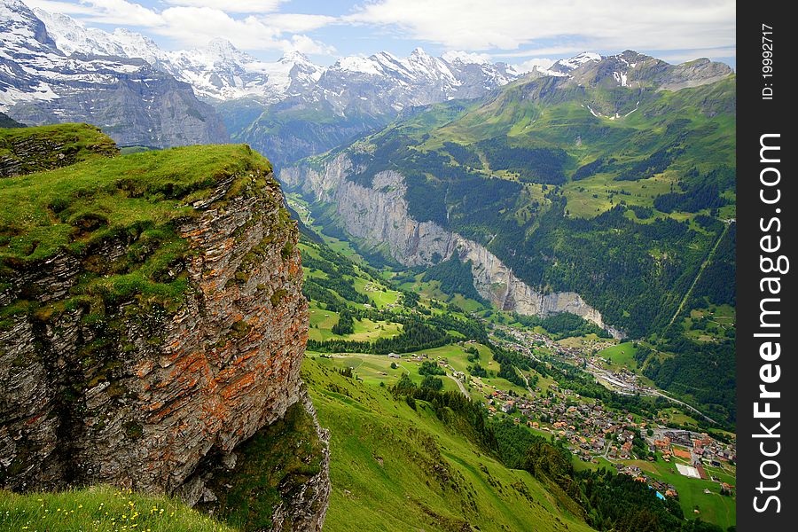 The Swiss village of Lauterbrunnen (near Grindelwald) as seen from the peak of Maennlichen Mountain. The Swiss village of Lauterbrunnen (near Grindelwald) as seen from the peak of Maennlichen Mountain.