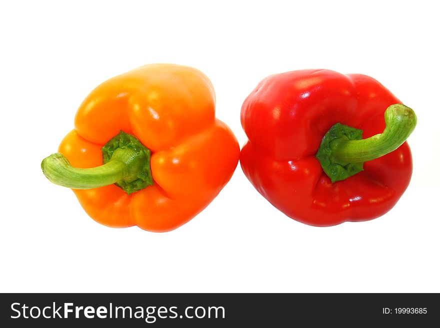 Rosy and red peppers isolated on white background