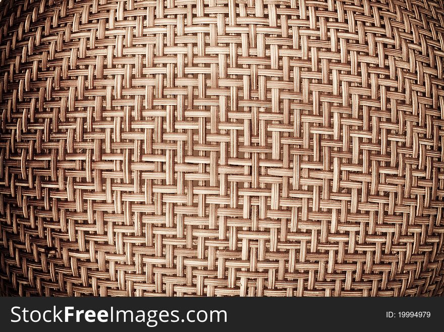 A close-up texture of rattan basket. A close-up texture of rattan basket.